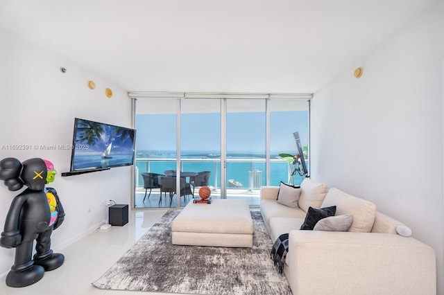 465 E Brickell Ave Unit 5305, Miami, FL 33131 - bedroom with a wall of windows and baseboards
