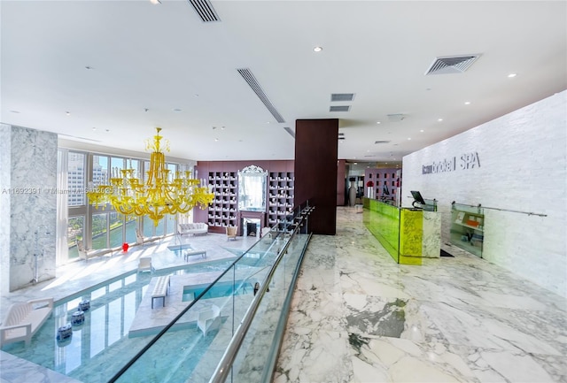 465 E Brickell Ave Unit 5305, Miami, FL 33131 - view of swimming pool with a chandelier