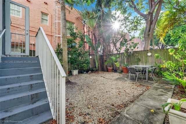 420 15th St Unit 107, Miami Beach, FL 33139 - fenced backyard featuring a patio