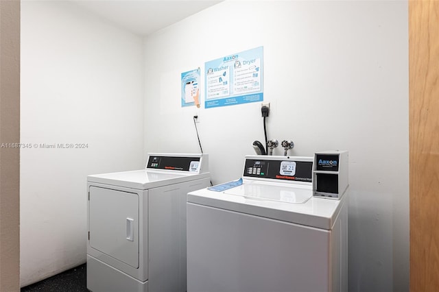 laundry area with washer and clothes dryer