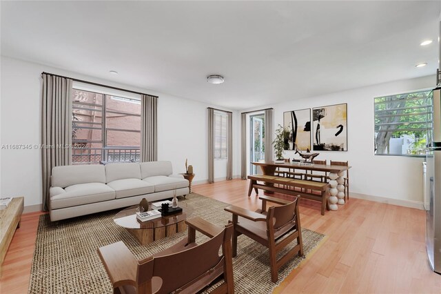 420 15th St Unit 107, Miami Beach, FL 33139 - living area featuring light wood finished floors, baseboards, and recessed lighting