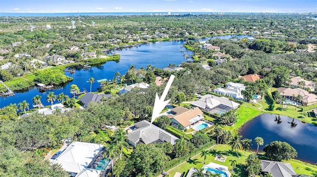 drone / aerial view with a water view