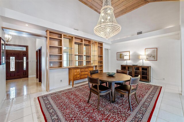 tiled dining space featuring wooden ceiling, high vaulted ceiling, french doors, sink, and a notable chandelier