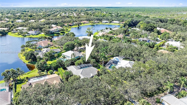 drone / aerial view with a water view