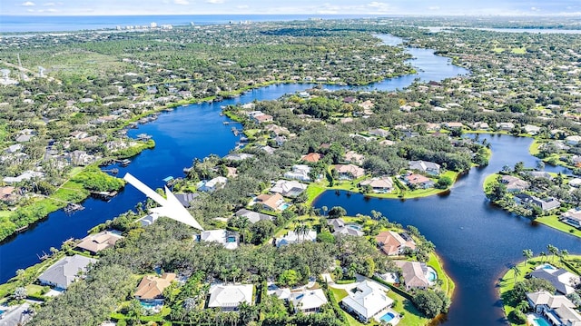 bird's eye view with a water view