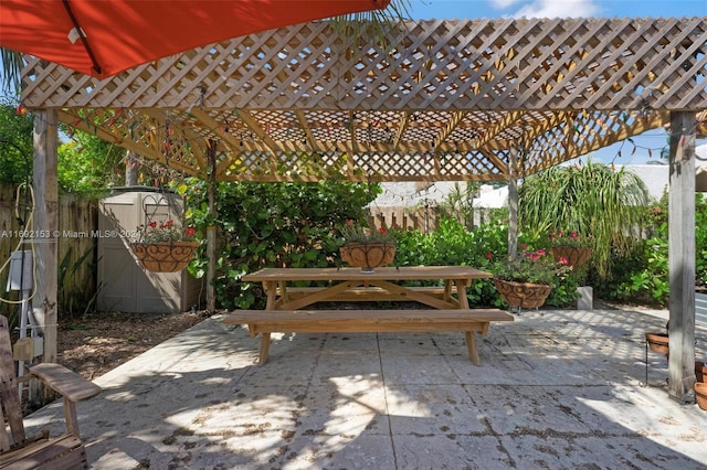 view of patio / terrace featuring a shed