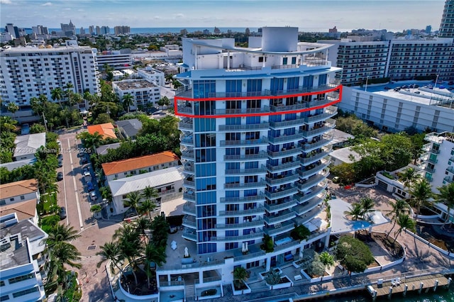 birds eye view of property featuring a city view