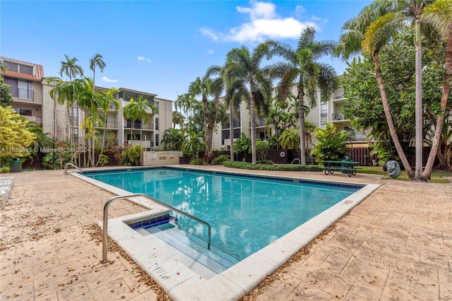 view of swimming pool with a patio area