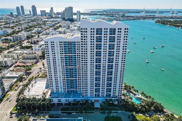 birds eye view of property featuring a water view