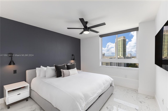 bedroom featuring ceiling fan