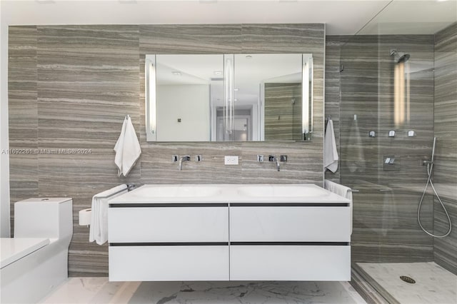 bathroom with tile walls and a tile shower