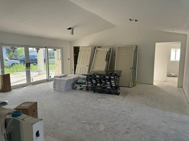 living room with vaulted ceiling