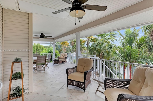 view of patio featuring ceiling fan