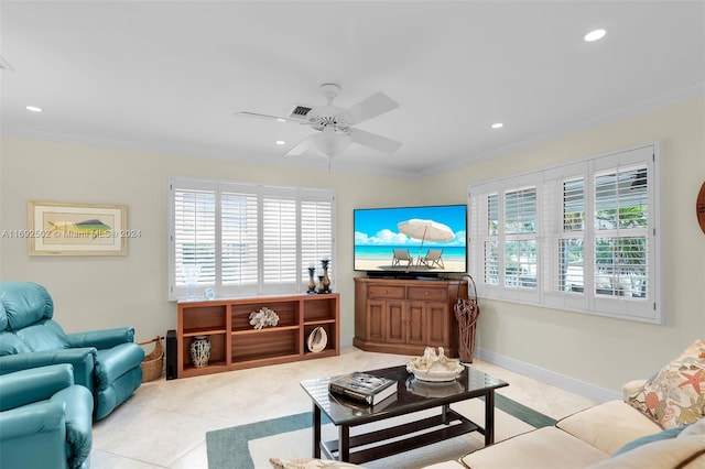 living room with light tile patterned floors, ceiling fan, and crown molding