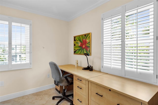 tiled office space featuring ornamental molding and plenty of natural light