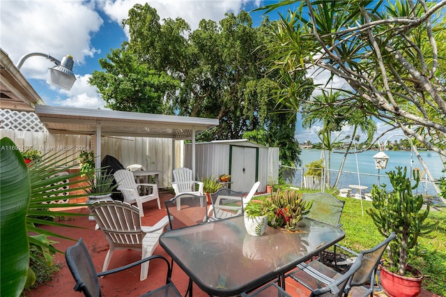 view of patio / terrace featuring a storage unit