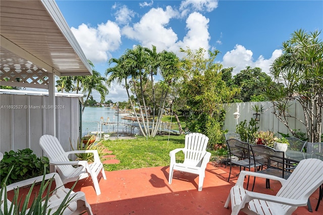 view of patio / terrace featuring a water view