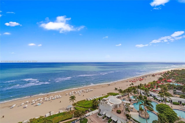 bird's eye view featuring a view of the beach and a water view