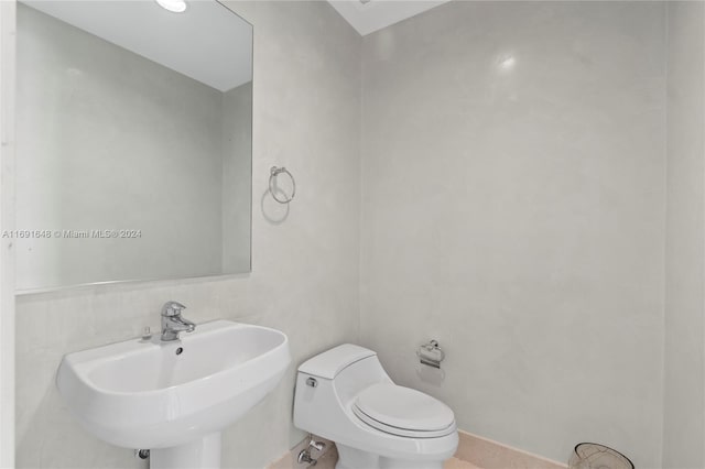 18101 Collins Ave Unit 1502, Sunny Isles Beach, FL 33160 - half bath featuring a sink and toilet