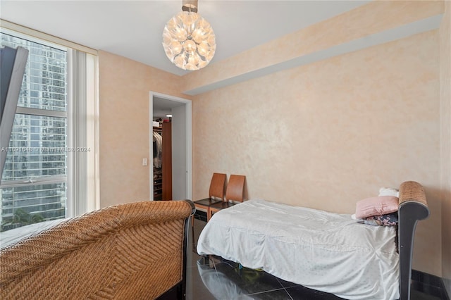 18101 Collins Ave Unit 1502, Sunny Isles Beach, FL 33160 - bedroom with a chandelier