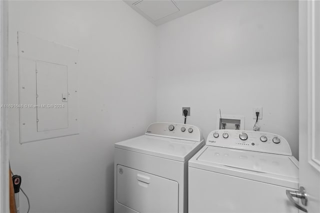 18101 Collins Ave Unit 1502, Sunny Isles Beach, FL 33160 - laundry area with washing machine and dryer and electric panel