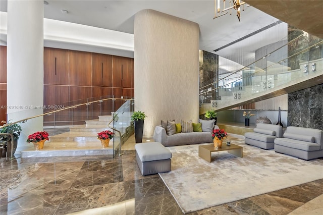 18101 Collins Ave Unit 1502, Sunny Isles Beach, FL 33160 - lobby featuring stairway and a high ceiling