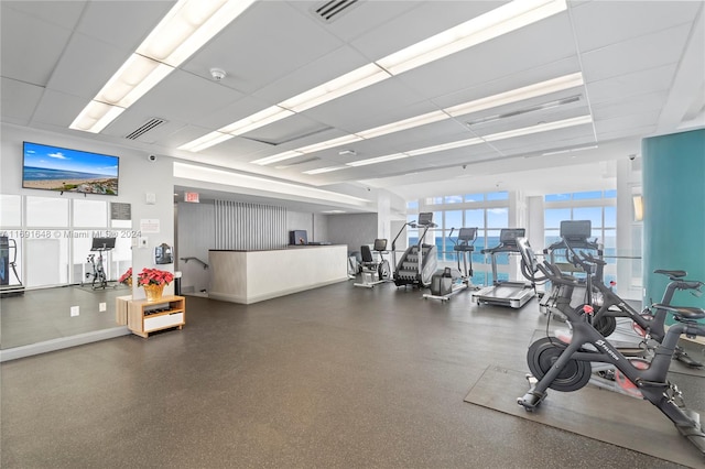 workout area featuring a drop ceiling