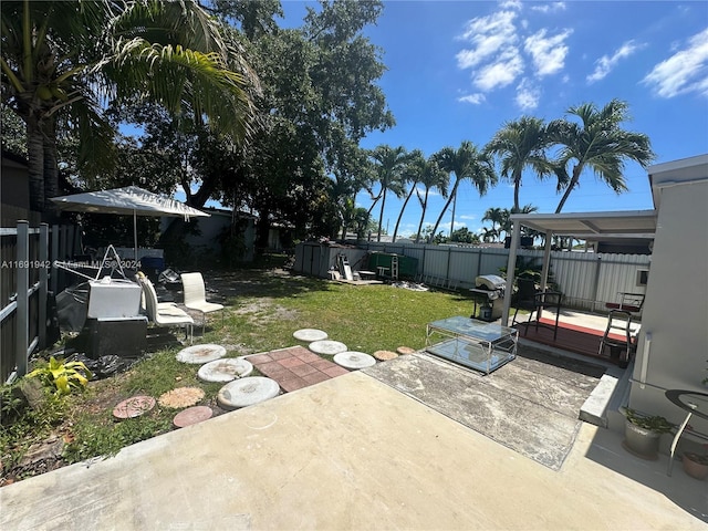 view of yard with a patio area