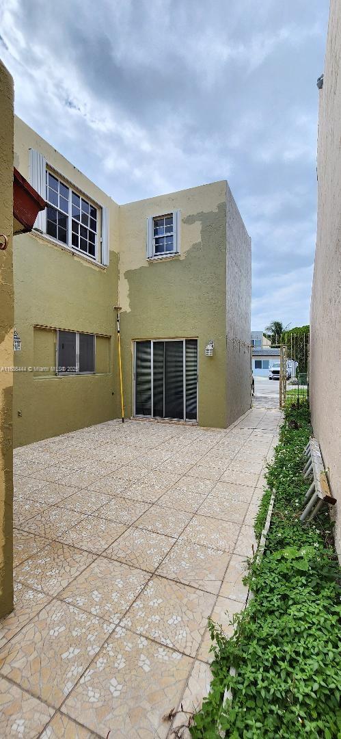 back of house featuring a patio area