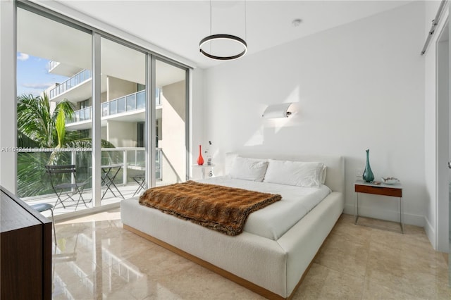 bedroom featuring multiple windows, access to outside, and floor to ceiling windows