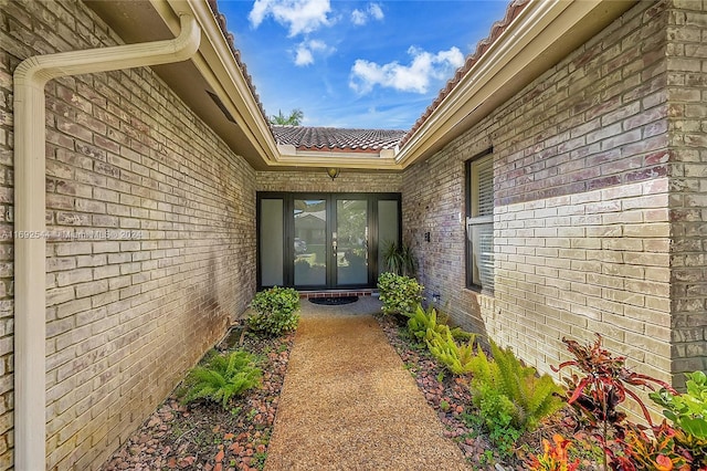 property entrance featuring french doors