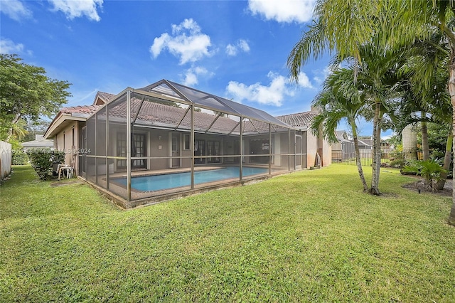 exterior space with a fenced in pool and a lanai