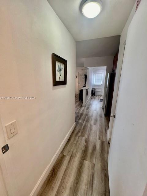 hall featuring hardwood / wood-style flooring