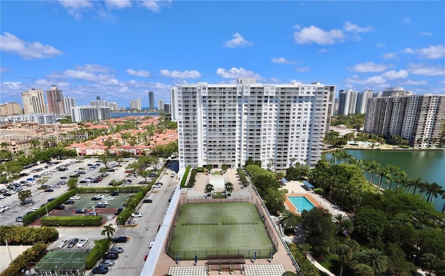 birds eye view of property with a water view