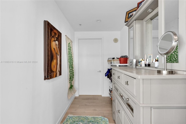 hallway featuring light hardwood / wood-style floors