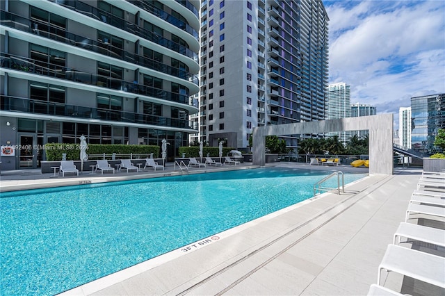 view of pool with a patio