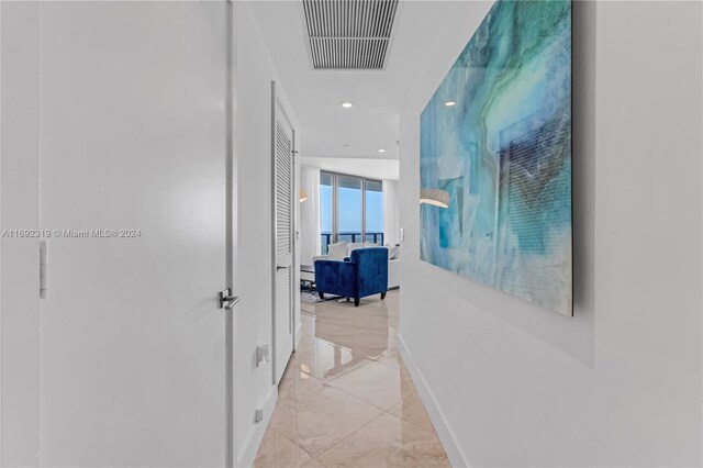 121 NE 34th St Unit 3116, Miami, FL 33137 - hall with baseboards and recessed lighting