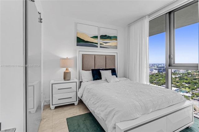 121 NE 34th St Unit 3116, Miami, FL 33137 - bedroom featuring floor to ceiling windows