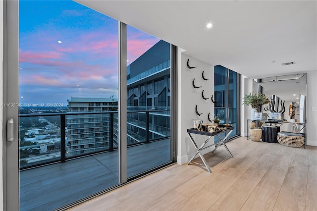 view of balcony at dusk