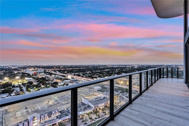 view of balcony at dusk