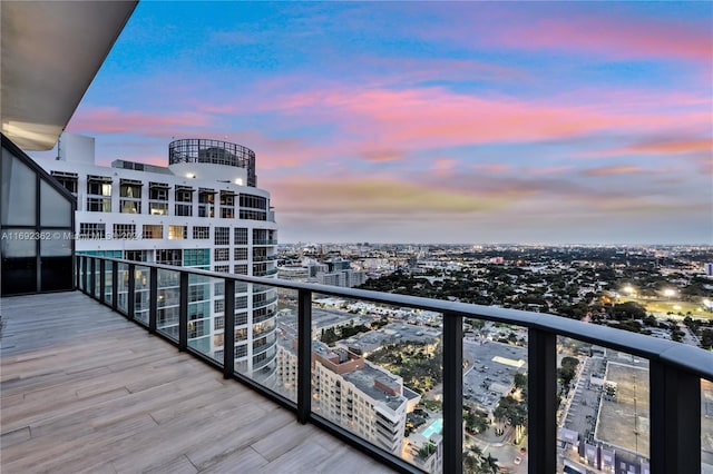 view of balcony at dusk