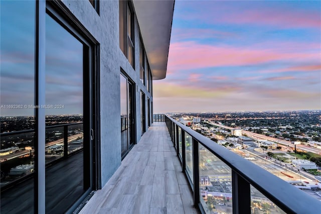 view of balcony at dusk