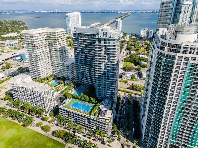 birds eye view of property featuring a water view