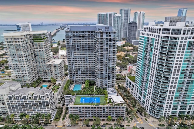 aerial view at dusk with a water view