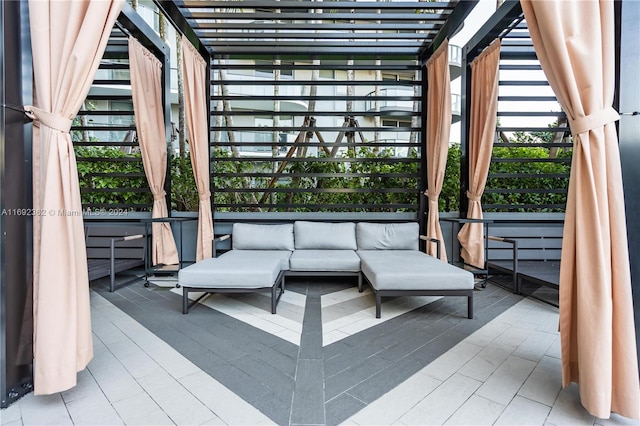 view of patio featuring outdoor lounge area and a pergola