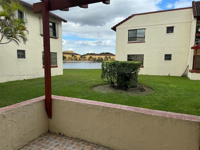 view of yard with a water view