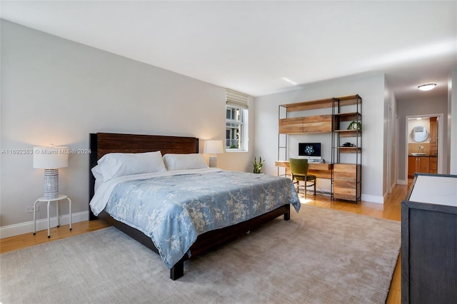 bedroom featuring light hardwood / wood-style flooring