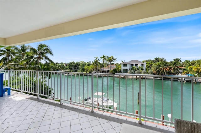 balcony featuring a water view