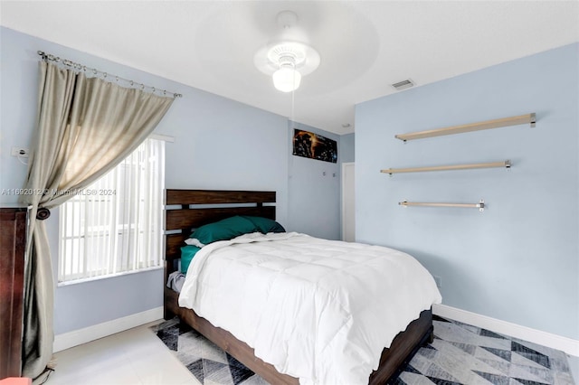 bedroom featuring ceiling fan