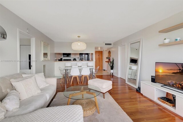 living room with hardwood / wood-style flooring